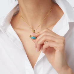 The Met Store Necklaces*Wedjat Eye Scarab Spinning Pendant Necklace